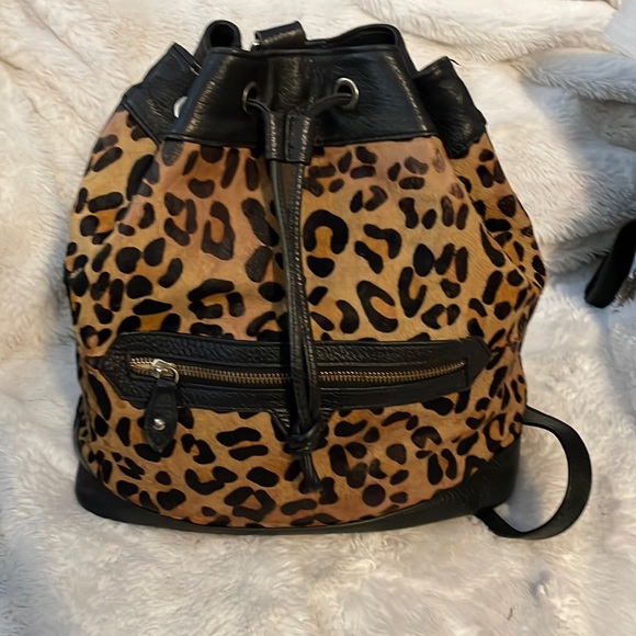 bespoke travel tech backpack Saola · Tan by Capra Leather 17 inches). csr=Sustainable Embroidered Bee Backpack: Mini Color:Ocean Green